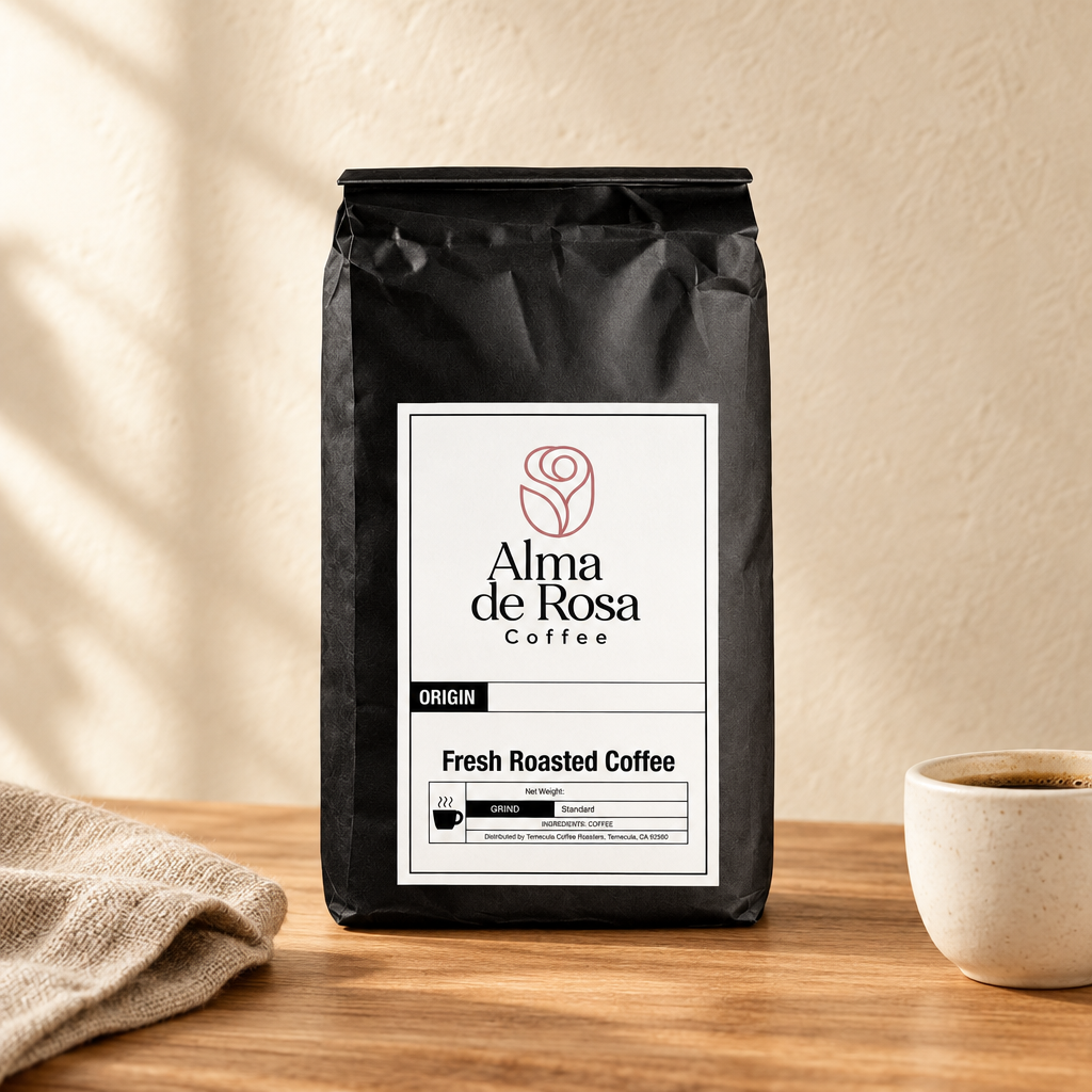 Alma de Rosa Coffee with Mushrooms Medium Roast bag on natural oak with an ivory coffee cup and linen